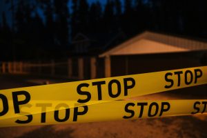 lines of caution tape that say "stop" indicating the warning signs of a high functioning alcoholic.