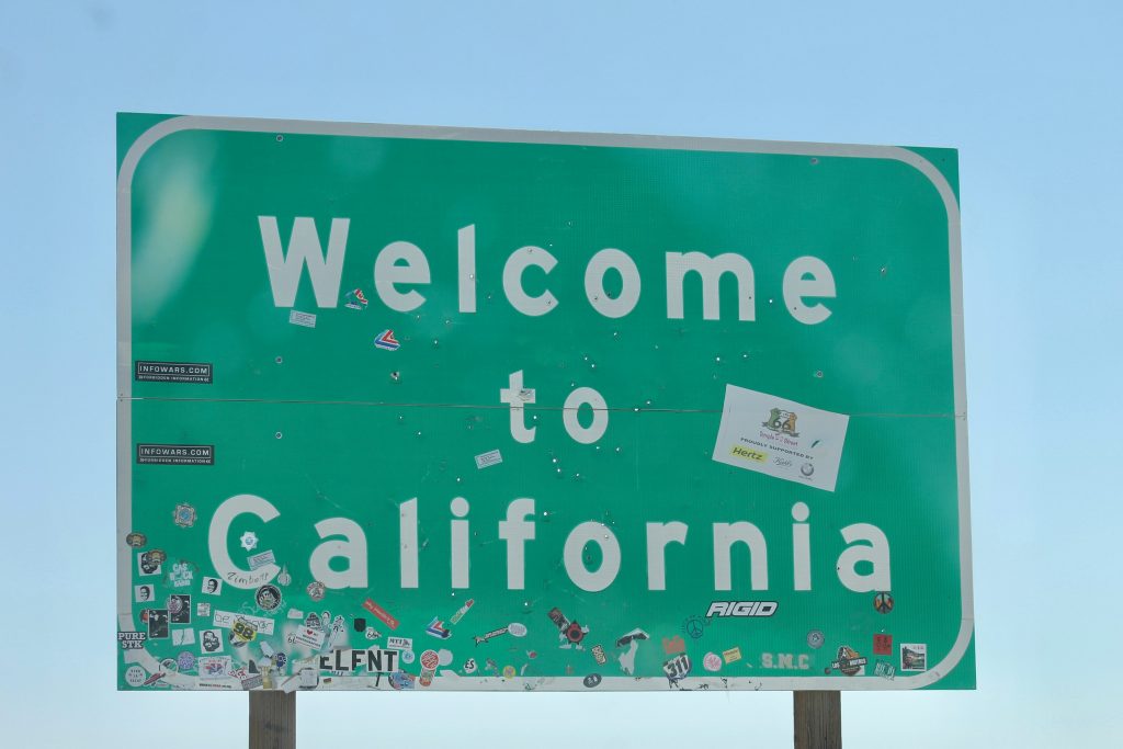 A sign saying "welcome to California" welcoming those who are thinking about being California sober.